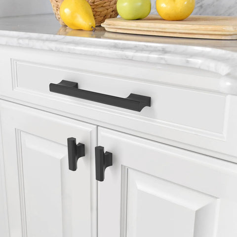 Installed matte black cabinet pulls set 10 pack 5 inch 128mm center to center kitchen cabinet handles hardware on white cabinetry.
