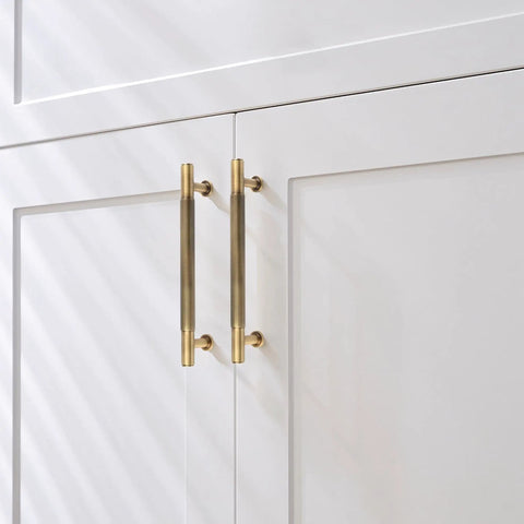 Five Pack Antique Brass Cabinet Pulls 5 Inch Solid Brass Dresser Drawer Handles For Your Cabinets Cupboards Wardrobes Closets And Vanities Durable Hardware installed on white cabinets