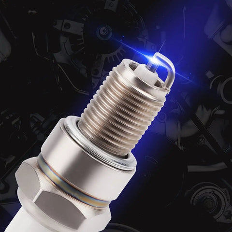 Close-up of spark plug from High Performance Spark Plug Set for Honda GX Series Lawn Equipment And Small Engines Great For Lawn Care Pros
