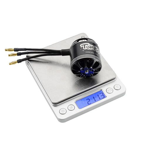 4250 Evo Outrunner Brushless Motor 600KV 800KV for UAV drones shown on digital scale displaying 211.3 grams, high torque design.