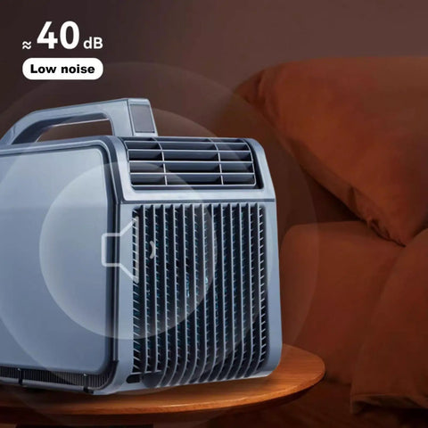 4 in 1 Portable Air Conditioner for Home or Office with Cooling and Heating, Dehumidifier, Quiet Fan, Remote Control and Touch Panel, Compact Swamp Cooler for All Season Comfort on a coffee table.