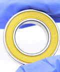Close-up of Ceramic Hybrid Radial Bearing 15X26X7Mm 152672RS showing stainless steel ring and golden seal