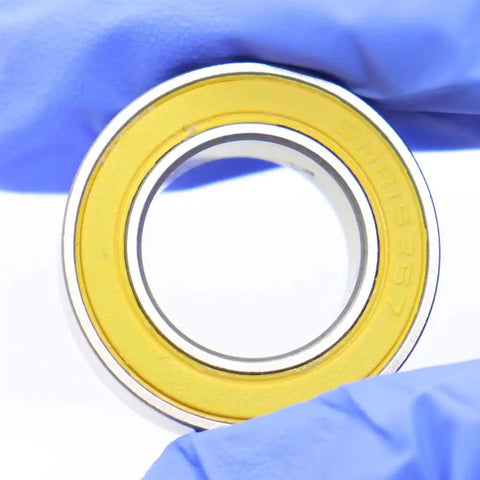 Close-up of Ceramic Hybrid Radial Bearing 15X26X7Mm 152672RS showing stainless steel ring and golden seal