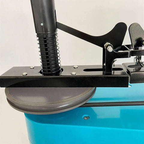 Close-up of the Centripetal Force Demonstrator's hand-cranked transmission wheel showing a detailed view of the mechanism.