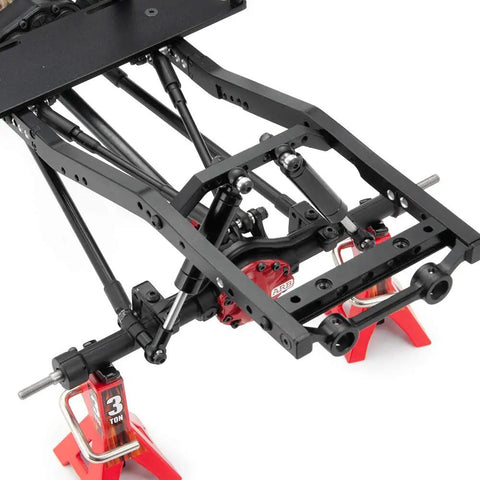 Close-up of 4 Pack 120mm RC Shock Absorbers With Internal Springs For 1/10 Scale Crawlers on model frame, highlighting installation.