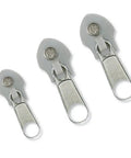 Three Piece Zipper Repair Kit In Silver Quick Clip And Zip Zipper Fix For Jeans Purses Jackets And More No Sewing Needed Durable Polypropylene Set Of 3 Easy To Use Tools For Fast Repairs.