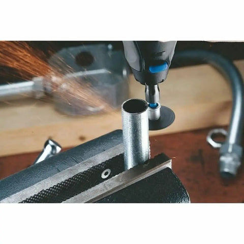 EZ SpeedClic Cutting Wheel Accessory Set With 12 Metal Cutting Discs For Rotary Multi Tool Fiberglass Reinforced 38mm Diameter 3.2mm Shank Quick Change System used to cut a metal pipe secured in a vise