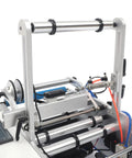 Close-up of Semi Automatic Label Applicator Round Bottle Labeling Machine With High Precision Fiber Sensor and 300W Motor details.