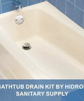 Brushed Nickel Tub Drain Conversion Kit with Tip Toe Trim installed in bathtub, showing 2 Hole Overflow Faceplate.