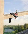 Steel Pneumatic Rafter Hook Hanger With One Quarter Inch Air Tool Swivel Fitting attached to wooden beam outdoors