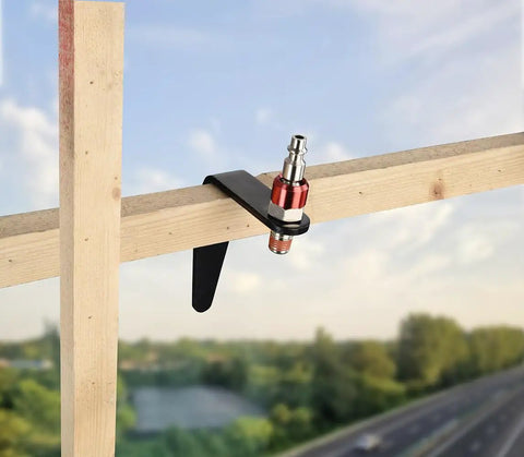 Steel Pneumatic Rafter Hook Hanger With One Quarter Inch Air Tool Swivel Fitting attached to wooden beam outdoors
