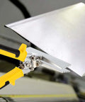 6 Inch Sheet Metal Hand Seamer with Straight Jaw Pliers bending a metal sheet, anti-slip handles, precision notches visible.