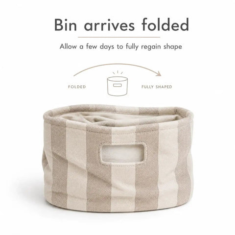 Slick Striped Woven Storage Basket With Beige And White Accents, 11x11 inches, showing folded state before regaining shape.