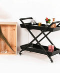 Rock Solid Three Tier Kitchen Storage Cart Featuring Circular Tempered Glass Top And Smooth Gliding Wheels Rust Resistant Steel Drink Trolley showcasing drinks and decor.