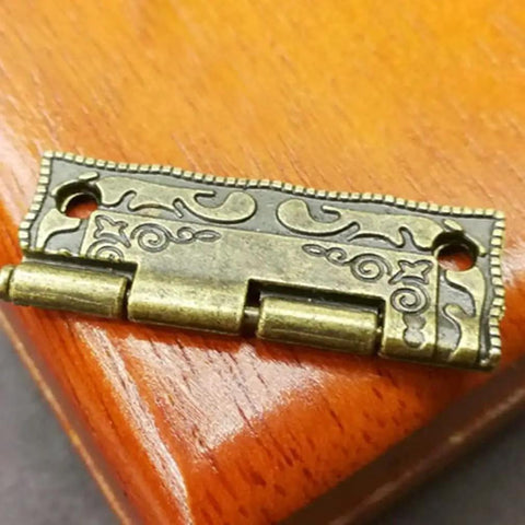 Straight Up Mini Vintage Brass Cabinet Hinge With Antique Drawer Catch For Wooden Furniture Restoration close-up view with detailed design