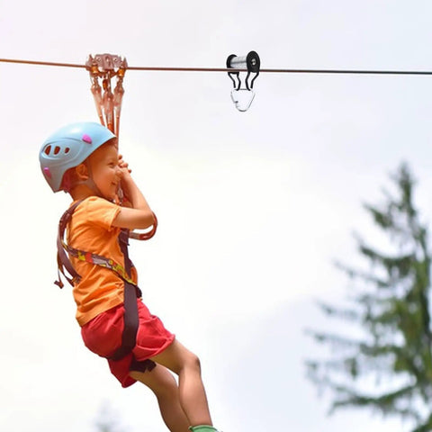 Child using Slackline Pulley Kit For Backyard Zipline And Slackline Heavy Duty Rope Pulley System With Low Friction Slider Iron Construction