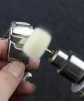 Pro Grade Rotary Tool Polishing Kit With Buffing Wheels And Felt Wool Pads Polish Compound Grinding Heads Point Tips And Mandrels One Eighth Inch Shanks Ideal For Jewelry And Metal Polishing Gear in use on watch surface
