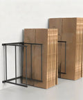 Industrial Grade Cardboard Box Organizer And Vertical Carton Storage Rack For Art Canvases Office Supplies Warehouse Packaging With Dead Simple Tool Free Setup, featuring stacked cardboard boxes.