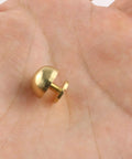Straight Fire Brass Half Inch Purse Feet With Screw Back Spike Studs For Handbags And Leather Craft Diy Gives Your Bag Major Swag Includes Four Polished Metal Tips, held in hand.