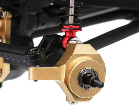 Close-up of Beefed Up Brass Steering Knuckles RC Counterweight Set for 1/24 Crawler Cars 8g each, installed on Axial SCX24