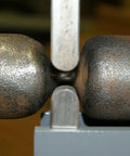 Guillotine Tool Set For Blacksmithing 5 Piece Fullering And Slashing Dies For Round Or Square Shoulders in use on metal