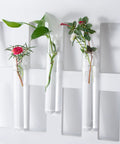 Three glass test tubes from the Glass Test Tube Set, 24 Pieces, 80ml Each, with plants, on a white background.