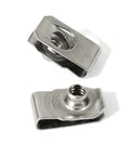 Close-up view of stainless steel U-nuts for auto body panel mounting, part of the Forty Pack Quarter Inch By Twenty Thread Stainless Steel U Nuts Clip On Panel Mounting Hardware Built Solid Gear Real Deal Lock Washer And Nut Combo For Auto Body Shop And Daily Driver Repairs.