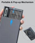 Hand holding the Badass Mini Electric Screwdriver Set with 70 Precision Bits and pop-up mechanism for easy access.