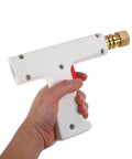 Hand holding automotive spot welding torch for cars, small welder for dent repair and metal restoration, precise welder tool