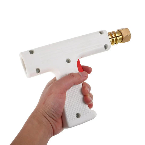 Hand holding automotive spot welding torch for cars, small welder for dent repair and metal restoration, precise welder tool