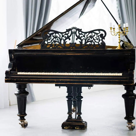 Built Tough Four Piece Vintage Brass Plate Casters With Smooth Rolling Heavy Duty Wheels Designed To Crush Heavy Loads And Kickstart Your Home Workbench Project on antique black grand piano.