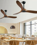 52 Inch Slick Ceiling Fan With Heavy Duty Solid Wood Blades And Silent Remote Control Smooth Airflow Top Tier Cooling For Your Summer Chill Vibe in a modern dining area.