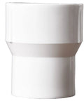 Close-up of a Ten Pack PVC Reducing Female To Female Threaded Coupling, one half inch to three quarter inch, white for plumbing projects.