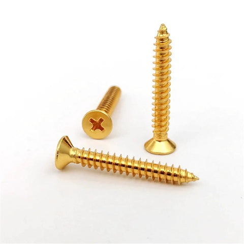 Close-up of Boss Grade Pro Brass Countersunk Flat Head Phillips Self-Tapping Wood Screws M5x16, 10 Pack, showcasing the screws' threads.