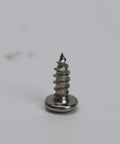 Close-up of a single screw used in Soft Close Tip Out Hinges For Tray Doors With Self Closing Damper 45 Degree Hidden Pivot Tilt Opening Scissor Cabinet Hinges For Bathroom Vanity Kitchen Closet Bookcase Comes With Screws And Durable Steel Construction