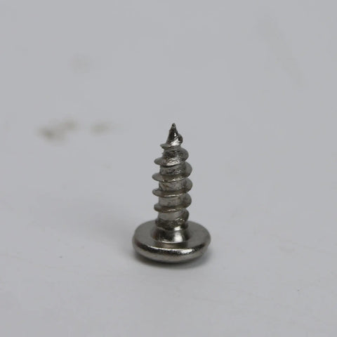 Close-up of a single screw used in Soft Close Tip Out Hinges For Tray Doors With Self Closing Damper 45 Degree Hidden Pivot Tilt Opening Scissor Cabinet Hinges For Bathroom Vanity Kitchen Closet Bookcase Comes With Screws And Durable Steel Construction