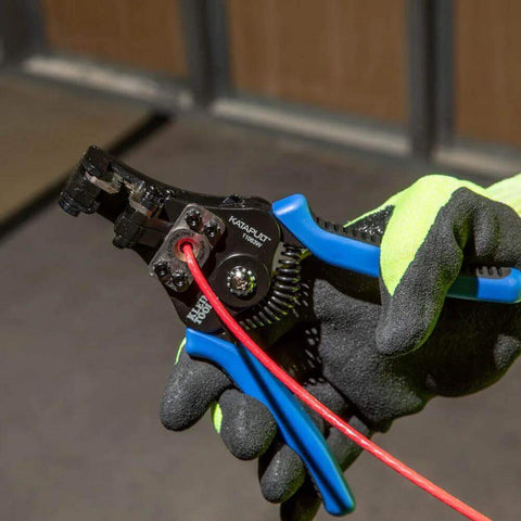 Heavy Duty Automatic Wire Cutter And Stripper For 8 To 20 AWG Solid And 10 To 22 AWG Stranded Wire being used on red wire