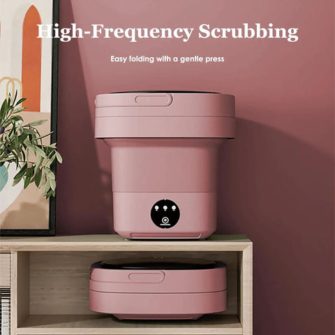 Tiny But Mighty Foldable Mini Washer Skip The Hand Wash Headache Grab And Go Compact Wash Station with built-in drain, pink color.