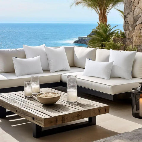 Pack of 2 16x16 Inch Outdoor Pillow Inserts Waterproof Decorative Throw Pillow Forms Square Lumbar Garden Cushions for Patio Sofa Couch Durable 380g High Density Fiber Fill for Plush Comfort displayed on a patio sofa with ocean view