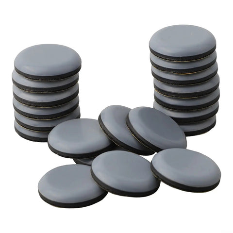 Stacks of Heavy Duty Furniture Sliders with 30mm PTFE Glides for chairs, sofas, beds and dining tables on wood and carpet.