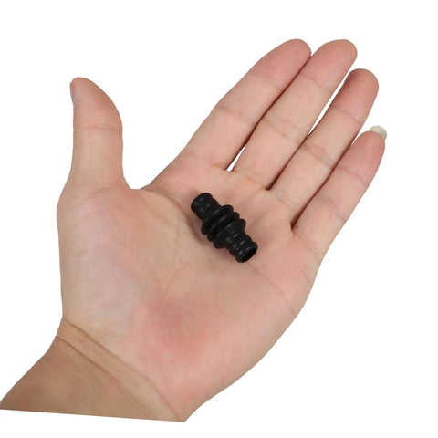 Espresso Steam Wand Sleeve Heatproof Rubber Insulation Cover for Coffee Machines held in hand for size reference