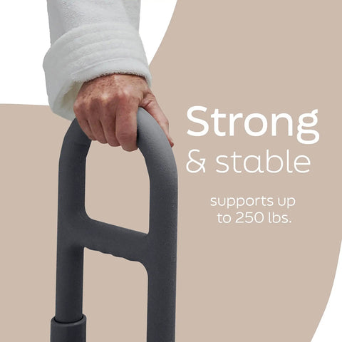 Deluxe Tub Grab Bar With Microban Protection 250 Lb Capacity Tool Free Installation Non Slip Rubber Pads Enamel Coated Steel ADA Compliant 1.25 Inch Grip Gray, hand gripping the bar
