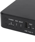 Heavy Duty Mini Ups Battery Backup Delivering Major Peace Of Mind With A Steady 10400mah Reserve And Six Amp Ports close-up view of power buttons and ports.