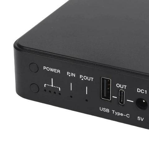 Hassle Free Mini UPS Battery Backup With 10400 Mah Capacity And Six Versatile Ports To Keep Home Routers And Surveillance Cameras Running Smoothly Without Sweat, showing ports and indicators.