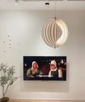 Dope 360 Degree Adjustable Moon Pendant Light with Rotating Sphere Shade in modern living area, semi embedded E26 base, white finish.