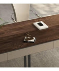 Next Level Standing Desk With Legit Storage Drawers And Rock Solid Steel Frame showing walnut surface with office items.