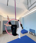 Aerial Lyra Hoop Rigging Set Gig Ready With Polyester Round Slings, in use for yoga hammock hanging, studio setup in background