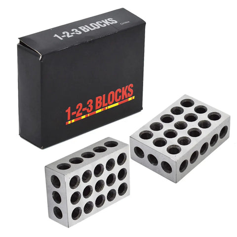 Pair Of 1 X 2 X 3 Inch Steel Blocks With 23 Holes And 0.0002 Inch Accuracy, Cross Drilled For Maximum Strength, Ideal For Milling Machine Setup Layout And Inspection Jobs. pair of steel 1x2x3 inch blocks with 23 holes and box packaging