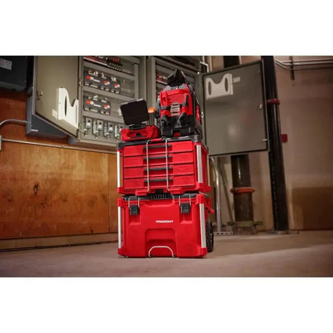 Red 22 Inch 4-Drawer Polymer Tool Box with Quick Adjust Dividers and Modular Storage System in workspace