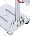 Close-up of the Eujgoov Mini Benchtop Drill Press With Variable Speed Up To 8000 Rpm, showcasing the aluminum alloy base and motor connection.